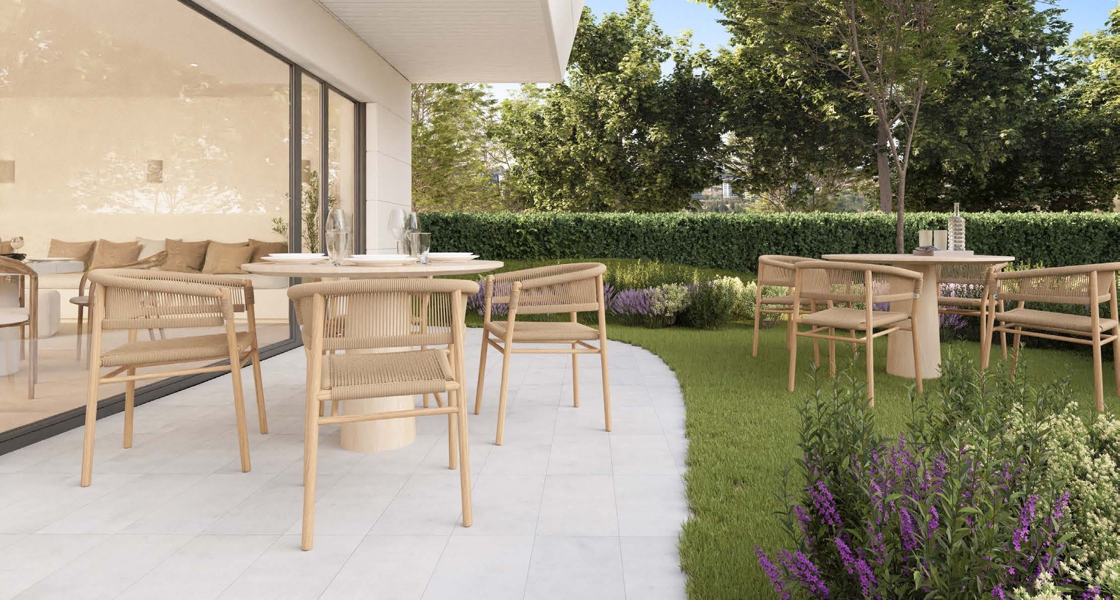 Terraza y jardín en una de las viviendas